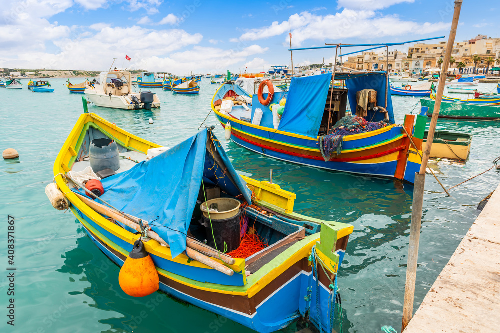 Typical fishing boats at the village of Marsaxlokk on the island of Malta