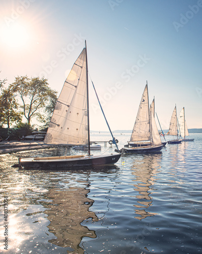 Sailboats on lake Balaton in sunset