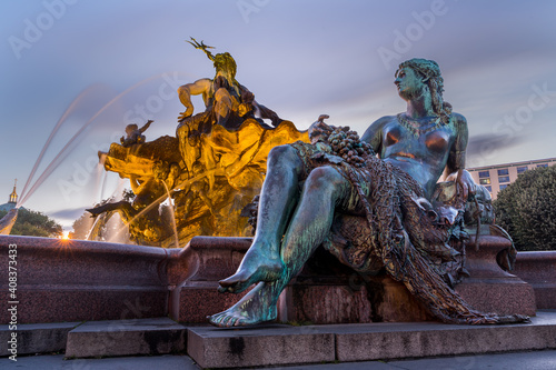 Berlin/July/29/2020 .Neo baroque Neptun fountain built by Reinhold Begas in 1888–1891 at the Schlossplatz in Berlin.  It was removed 1951 and used for the reshaping of east Berlin. photo