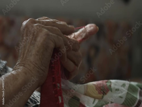 Elderly hands knitting