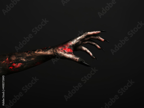Scary monster on black background, closeup of hand with space for text. Halloween character © New Africa