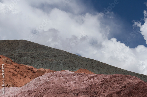Altiplano. Colorful hills under a beautiful blue sky. View of the mineral and rocky mountains in the arid desert. 