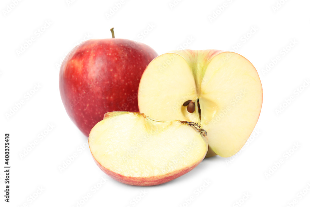 Fresh ripe red cut and whole apples isolated on white