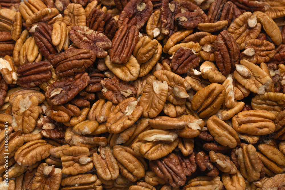 Tasty pecan-nut background. Top view. Tasty pecan-nut background. Top view.