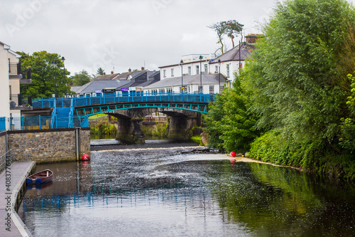 River Kesh flowing under the arched bridge in the centre of Kesh village in County Fermanagh Northern Ireland