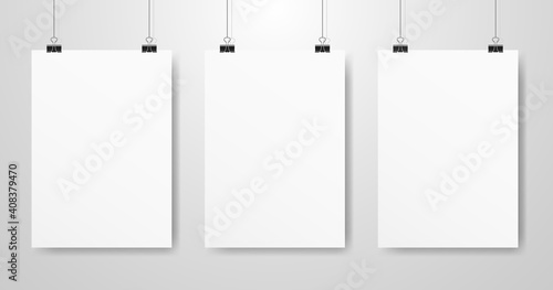 Poster mockups set. White A4 hanging on a light wall. Vertical template with soft shadow. Realistic business template. Clean banner on a rope. Vector illustration