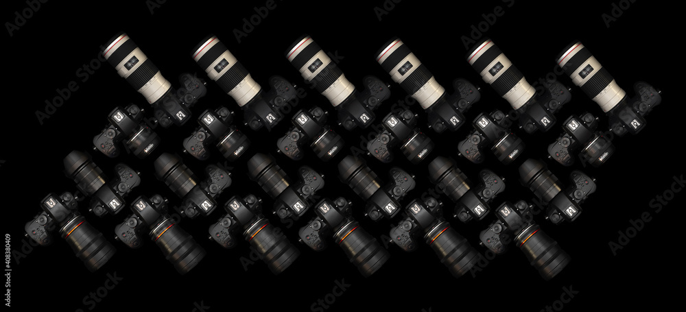Mirrorless Cameras with different lenses for shooting videos. Top view of digital cameras isolated on black background. Photography pattern design. Mirrorless Cameras with different lenses for shooting videos. Top view of digital cameras isolated on black background. Photography pattern design.