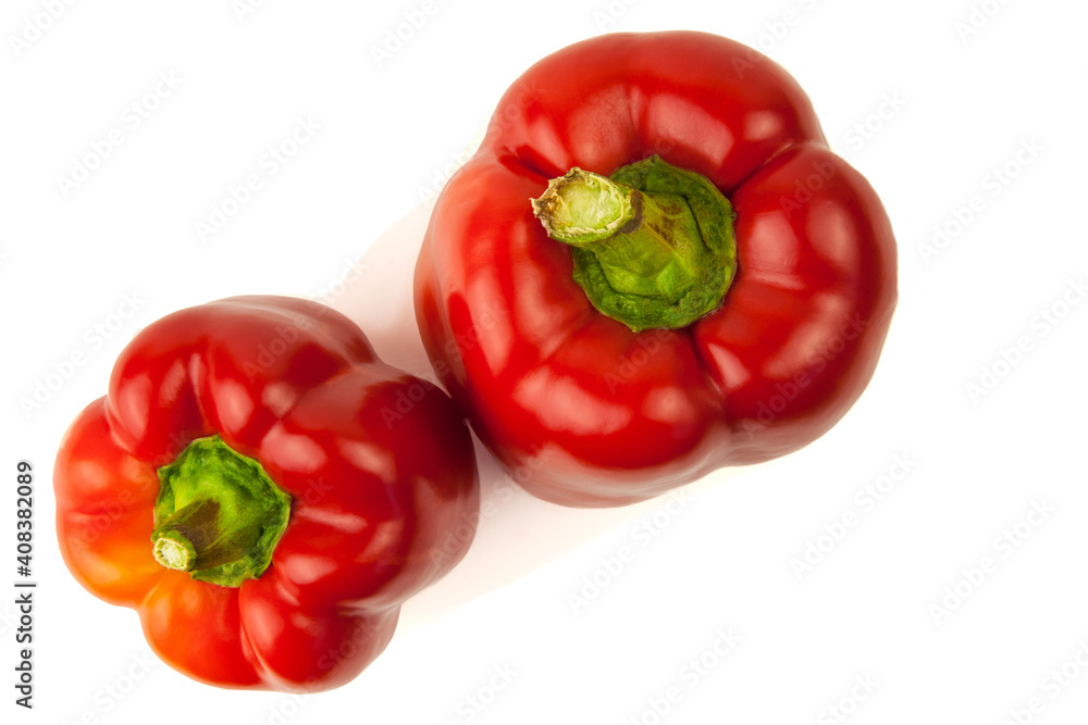 Two pieces of fresh red bell peppers isolated on a white background. Top view Two pieces of fresh red bell peppers isolated on a white background. Top view