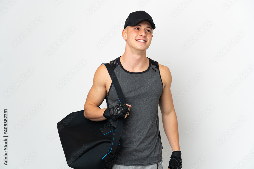 Young sport caucasian man with bag isolated on white background thinking an idea while looking up Young sport caucasian man with bag isolated on white background thinking an idea while looking up