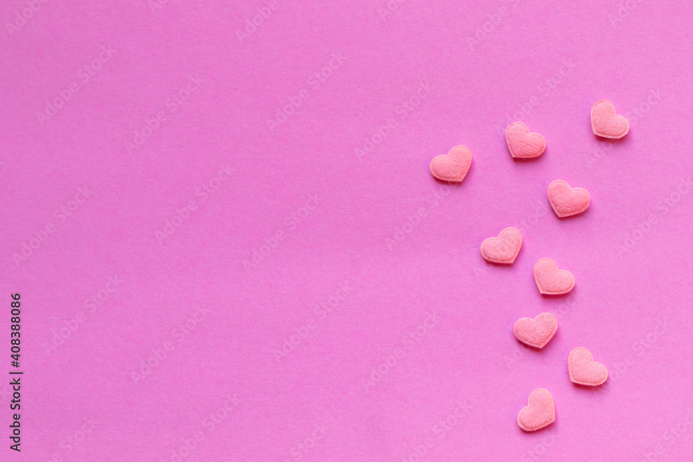 Several pink little hearts arranged in a row