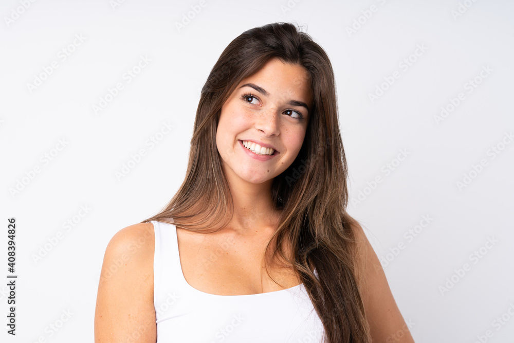 Portrait of pretty teenager Brazilian girl over isolated background Portrait of pretty teenager Brazilian girl over isolated background