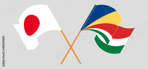 Crossed and waving flags of Japan and Seychelles