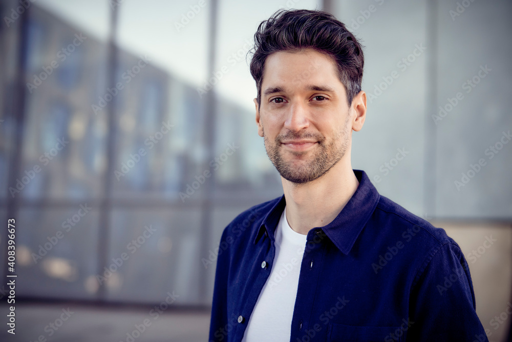 Confident entrepreneur standing outdoors Confident entrepreneur standing outdoors