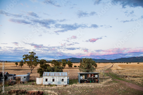 Old farm sheds in the evening light photo