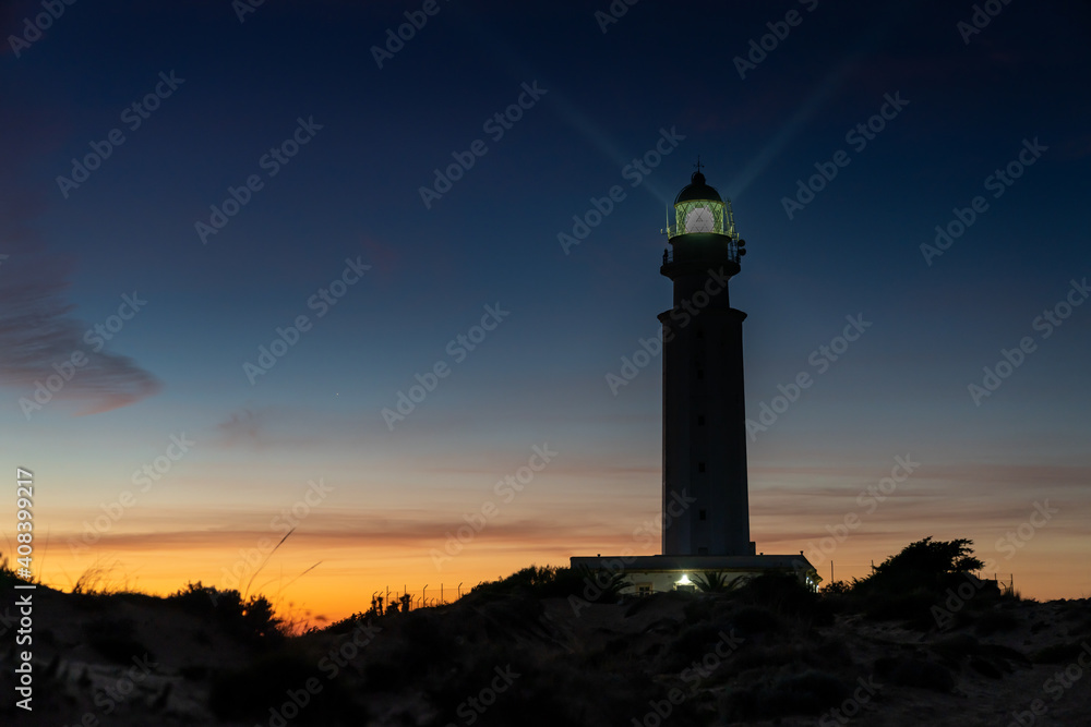 the Cape Trafalgar lighthouse signal light after sunset with colorful evening sky