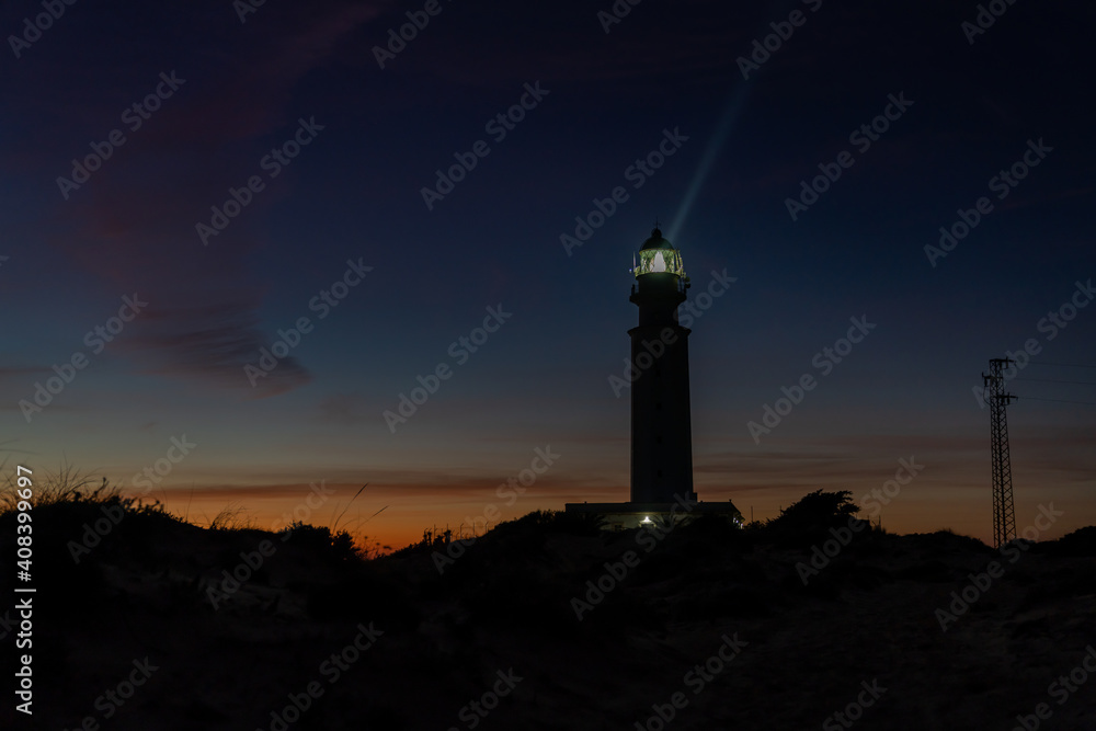 the Cape Trafalgar lighthouse signal light after sunset with colorful evening sky