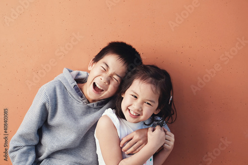 Happy multicultural boy and girl