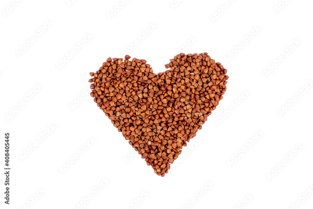 Buckwheat heart isolated on white background. Buckwheat in the shape of a heart. Photography for design. Valentines day concept Buckwheat heart isolated on white background. Buckwheat in the shape of a heart. Photography for design. Valentines day concept