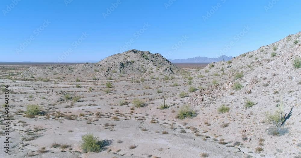 Low flight over barren feature in the desert aerial drone shot Low flight over barren feature in the desert aerial drone shot
