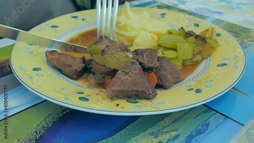 Eating a homemade stew plate
