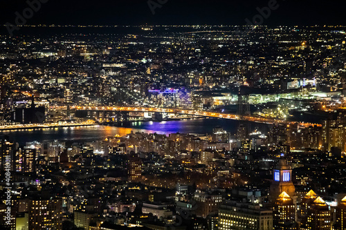 Scenic view of Manhattan bridge and downtown scyscrapers at night