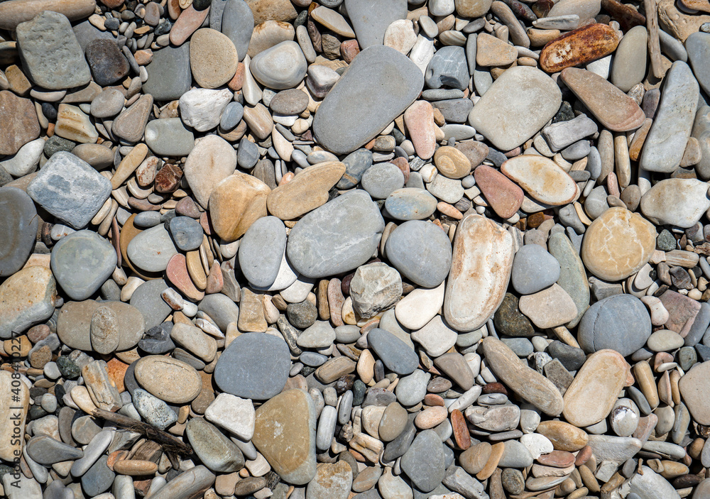 Pebbles or smooth rocks and with light gray texture Pebbles or smooth rocks and with light gray texture