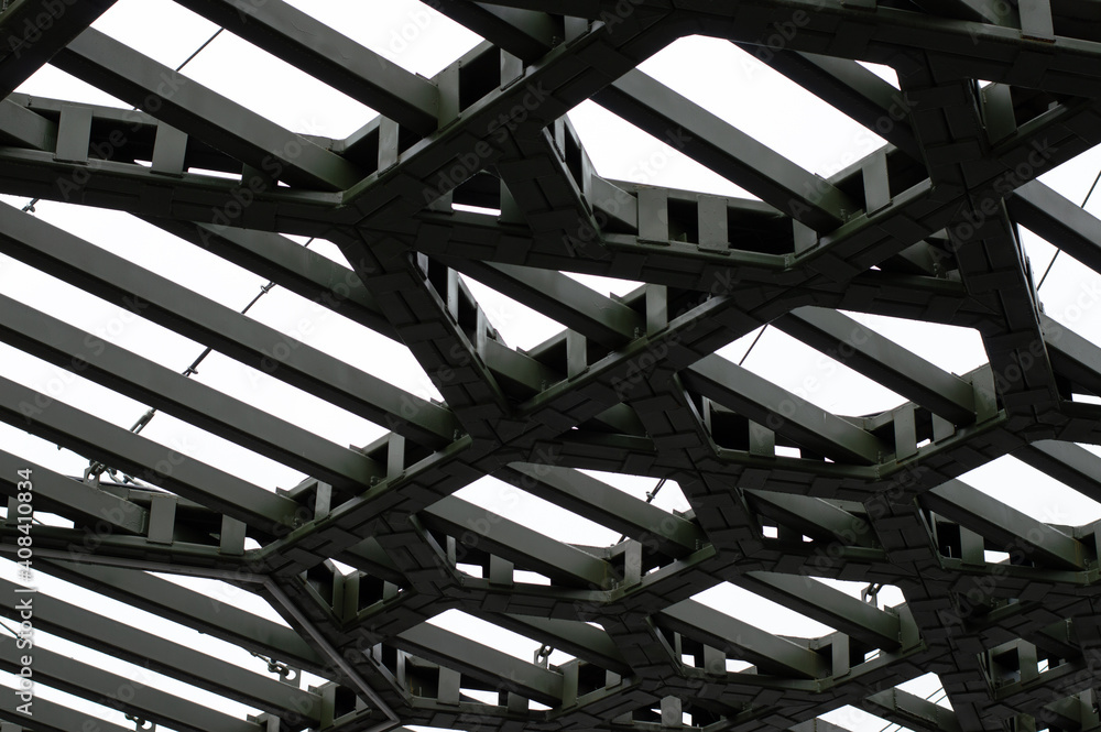 Metal roof structure in the park on a cloudy day.