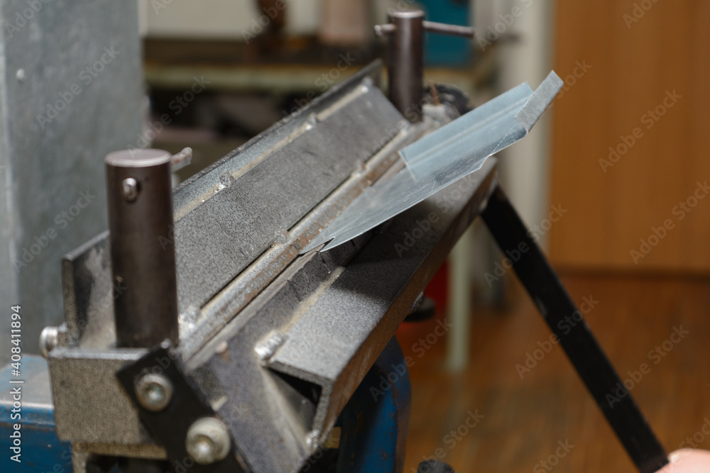 Craftsmen Worked With Sheet Metal Bending Machine