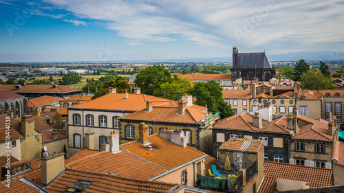 View from the top of the belfry on the Sainte Chapelle (Holy Chapel) and the roofs of the small town of Riom in Auvergne (France)  photo