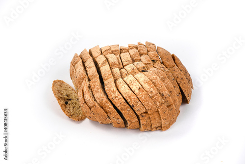 Sliced ketogenic bread made of oatmeal and coconut flour on a white background