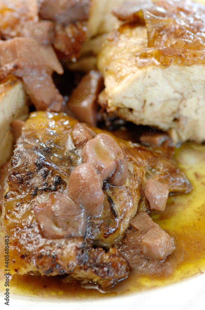 guinea fowl with mushrooms is a typical food of the Marche region and central Italy guinea fowl with mushrooms is a typical food of the Marche region and central Italy