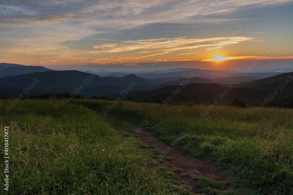 Appalachian Trail at sunset, view from Max Patch bald over the Great Smoky Mountains