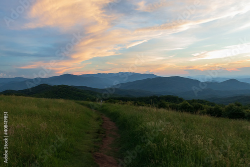 Appalachian Trail at sunset, view from Max Patch bald over the Great Smoky Mountains © Martina