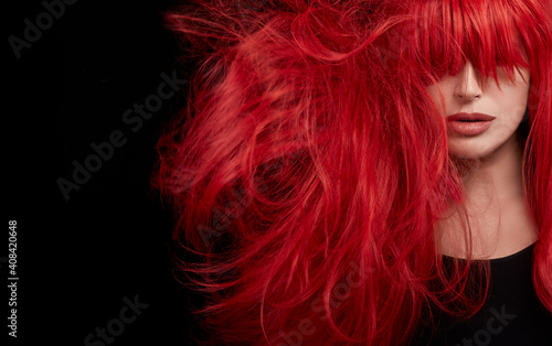 Fotografie, Obraz Female model shaking a healthy long and shiny red hair