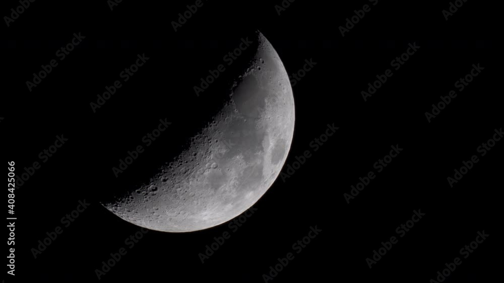 Half Moon Close Up. close up angle of a half moon with visible craters Half Moon Close Up. close up angle of a half moon with visible craters