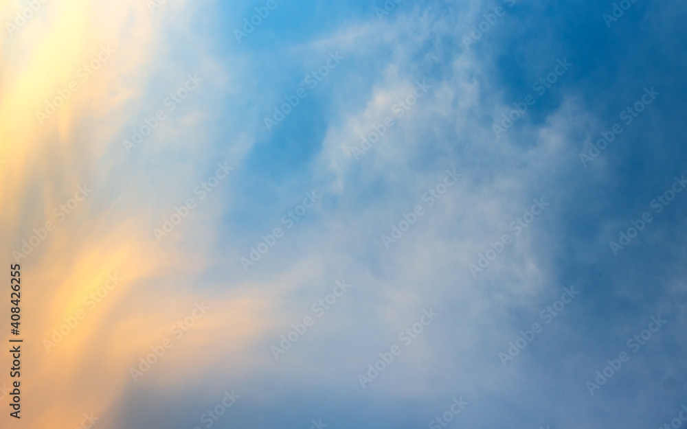 blue sky background with soft puffy cloudy