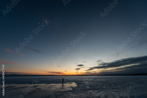 Sunset over Frozen Lake in Canada