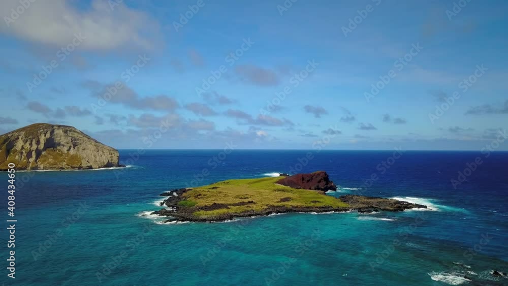 Flying to a small island in the middle of an ocean. Flying to a small island in the middle of an ocean.