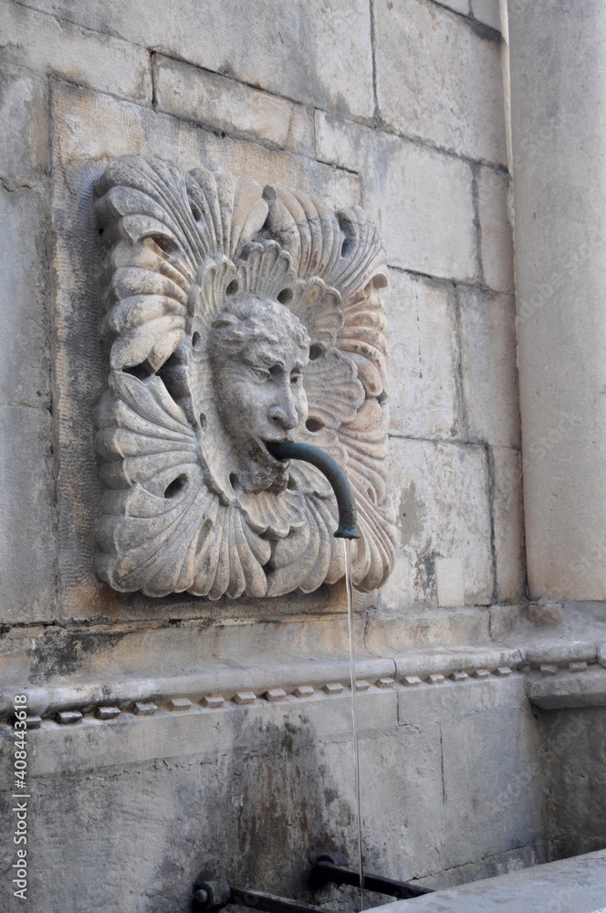 Carved detail on Onofrio fountain tap in Dubrovnik, Croatia