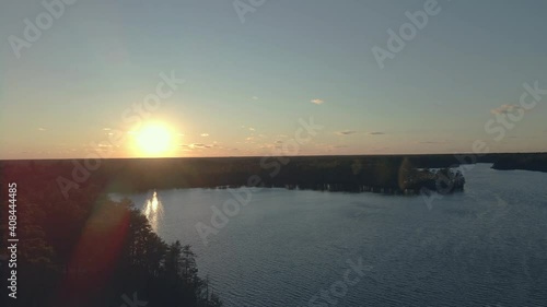 Sunset over the calm Atsion Lake and forest landscape of New Jersey - aerial photo