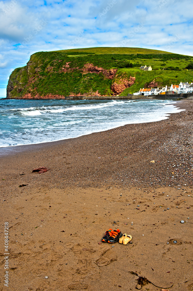 At The Beach Of The Fishing Village Pennan, Aberdeenshire, Scotland, Great Britain At The Beach Of The Fishing Village Pennan, Aberdeenshire, Scotland, Great Britain