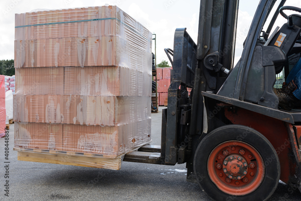 A Pallet Brick Is Transported By Forklift