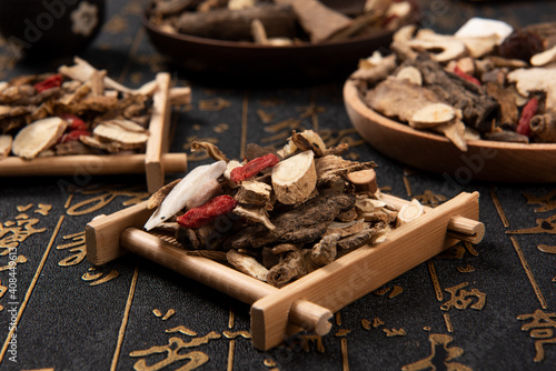 Obraz na plátně Chinese herbal medicine selection on calligraphy background