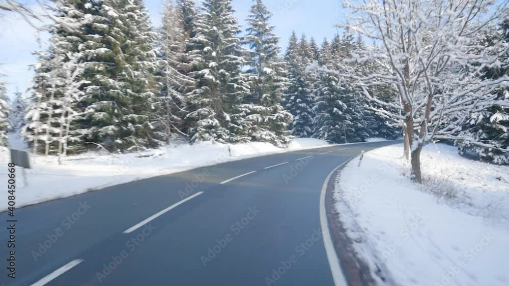 Driving in beautiful winter scenery in Germany. Fresh snow in scenic mountain landscape in Germany similar to the alps in Switzerland and Austria. Traffic in Europe. Driving in beautiful winter scenery in Germany. Fresh snow in scenic mountain landscape in Germany similar to the alps in Switzerland and Austria. Traffic in Europe.