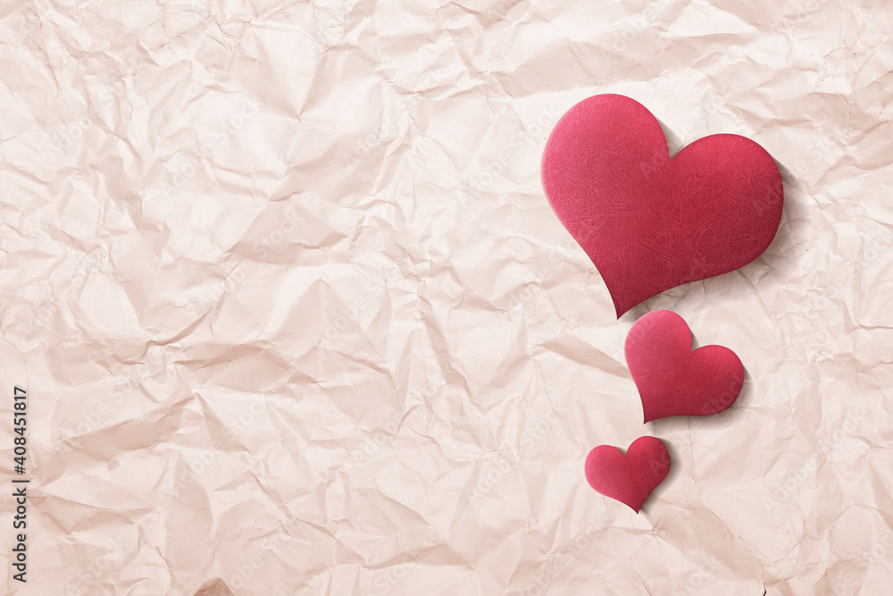 Red heart with crumpled paper background