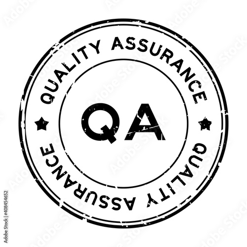 Grunge black QA quality assurance word round rubber seal stamp on white background