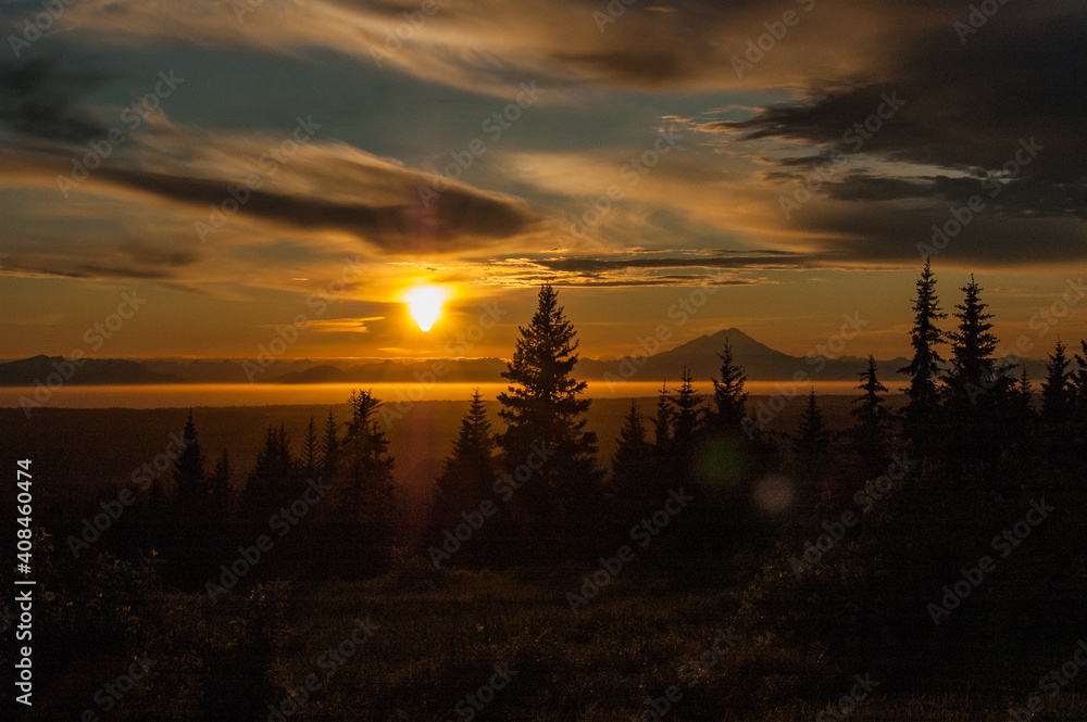 Alaskan sunset with mountain