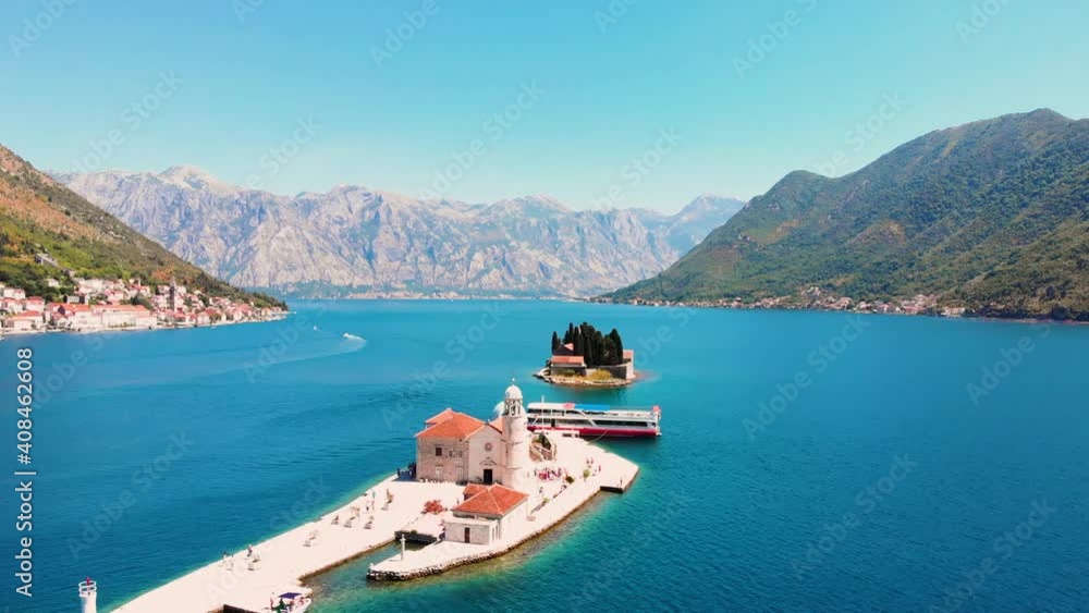 Perast, Bay of Kotor, Montenegro. Drone flying over the Our Lady of the Rocks. The island Saint George on the background. 4K Video Perast, Bay of Kotor, Montenegro. Drone flying over the Our Lady of the Rocks. The island Saint George on the background. 4K Video