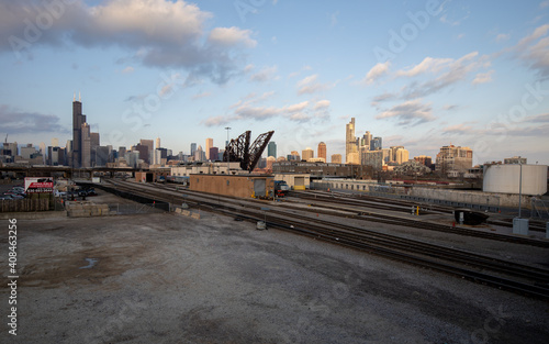 Chicago, Illinois, USA - December 23 2020: Chicago skyline with St. Charles Air Line Bridge. View from Amtrak Chicago Car Yard. 