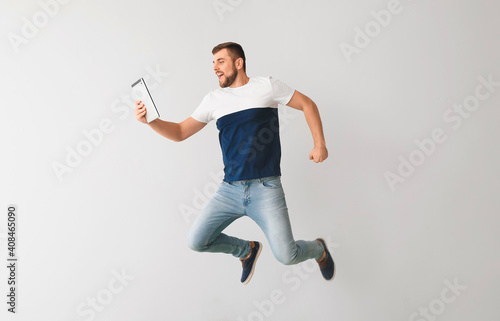 Young man with tablet compu...
